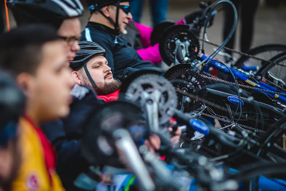 Zakelijke fotografie van een sportwedstrijd handbike creatief gefotografeerd zoor bedrijfsfotograaf Brabant